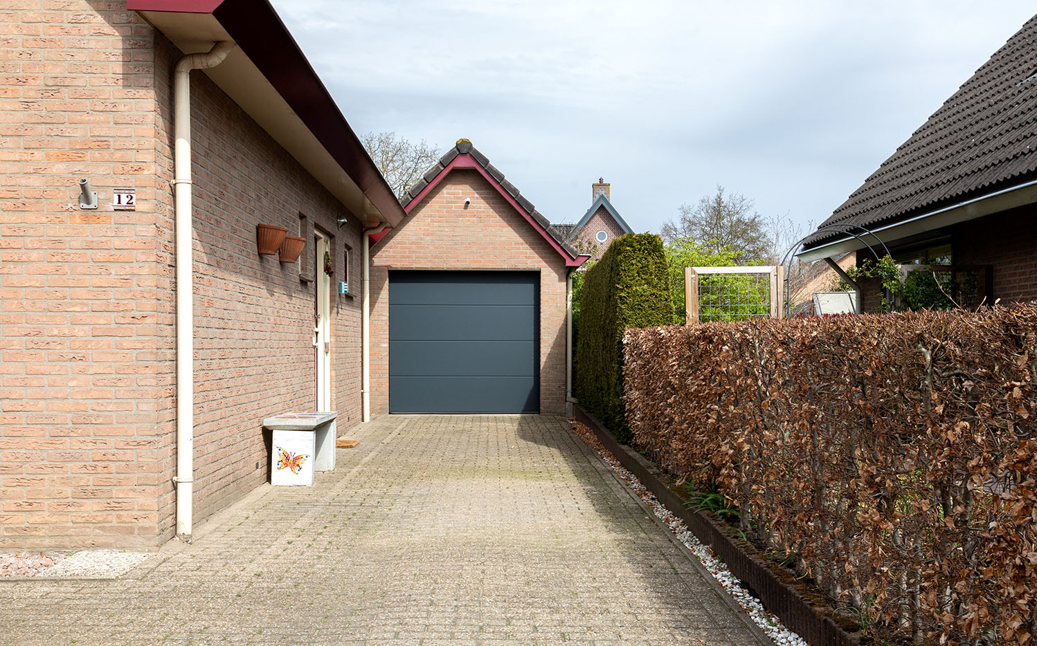 Renomatic Sectionaaldeur In Lunteren - Ruiter Garagedeuren